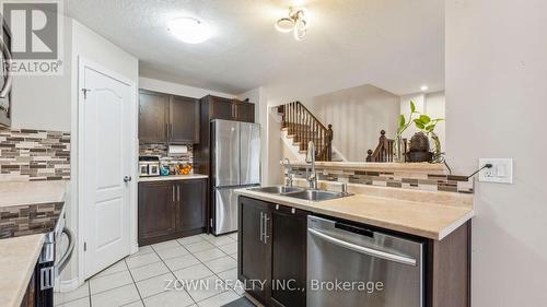 65 Curzon Crescent, Guelph, ON - Indoor Photo Showing Kitchen With Double Sink