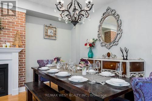 37 - 171 Snowbridge Way, Blue Mountains, ON - Indoor Photo Showing Dining Room With Fireplace