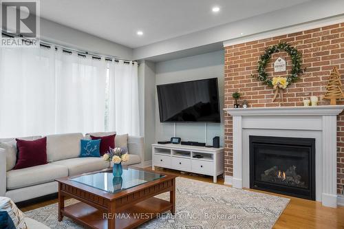 37 - 171 Snowbridge Way, Blue Mountains, ON - Indoor Photo Showing Living Room With Fireplace