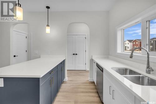 103 Taube Avenue, Saskatoon, SK - Indoor Photo Showing Kitchen With Double Sink