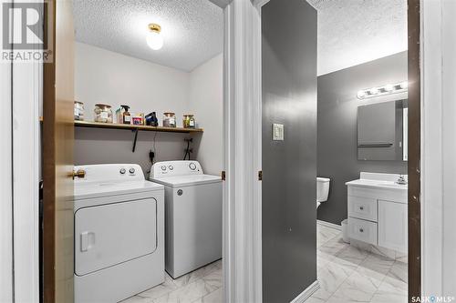 305 311 Tait Crescent, Saskatoon, SK - Indoor Photo Showing Laundry Room