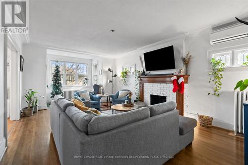 Upper - 88 Welland Avenue, Toronto, ON - Indoor Photo Showing Living Room With Fireplace