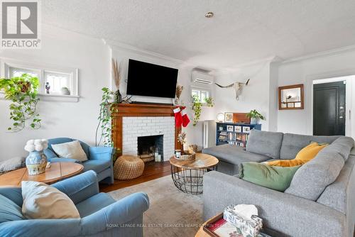 Upper - 88 Welland Avenue, Toronto, ON - Indoor Photo Showing Living Room With Fireplace