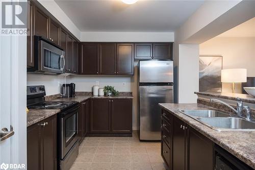 769 Challinor Terrace, Milton, ON - Indoor Photo Showing Kitchen With Double Sink