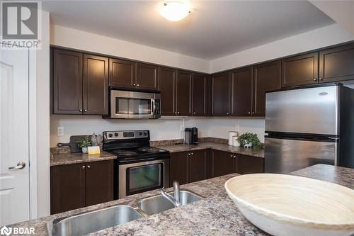 769 Challinor Terrace, Milton, ON - Indoor Photo Showing Kitchen With Double Sink