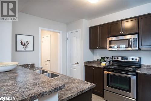 769 Challinor Terrace, Milton, ON - Indoor Photo Showing Kitchen With Double Sink With Upgraded Kitchen