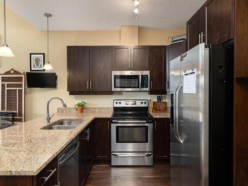 302-938 Dunford Ave, Langford, BC - Indoor Photo Showing Kitchen With Stainless Steel Kitchen With Double Sink With Upgraded Kitchen