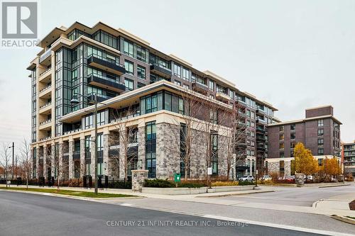 115 - 25 Water Walk Drive, Markham (Unionville), ON - Outdoor With Facade