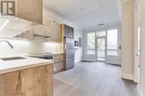 115 - 25 Water Walk Drive, Markham (Unionville), ON - Indoor Photo Showing Kitchen With Upgraded Kitchen