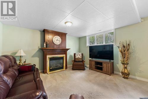 537 Angus Campbell Drive, Pembroke, ON - Indoor Photo Showing Living Room With Fireplace