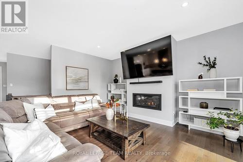 1595 Rangeland Avenue, Ottawa, ON - Indoor Photo Showing Living Room With Fireplace