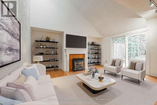 17 - 105 Wilson Street, Hamilton, ON - Indoor Photo Showing Living Room With Fireplace