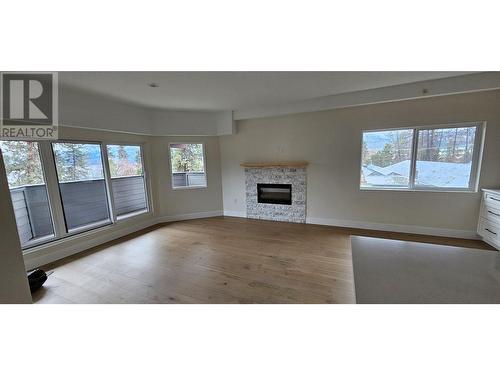 217 Elm Avenue Unit# 301, Penticton, BC - Indoor Photo Showing Living Room With Fireplace