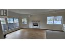 217 Elm Avenue Unit# 301, Penticton, BC  - Indoor Photo Showing Living Room With Fireplace 