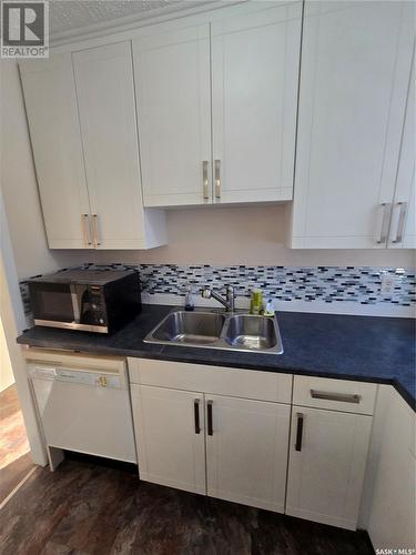 813 Souris Avenue, Weyburn, SK - Indoor Photo Showing Kitchen With Double Sink