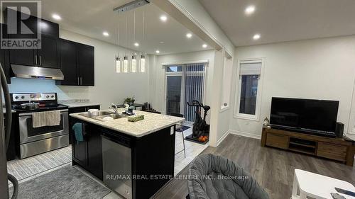 57 Truro Circle, Brampton, ON - Indoor Photo Showing Kitchen With Double Sink With Upgraded Kitchen