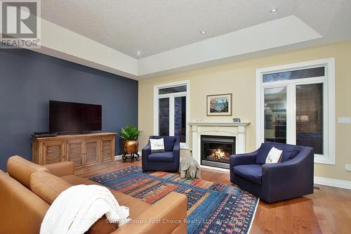 128 Sir Adam Beck Road, Stratford, ON - Indoor Photo Showing Living Room With Fireplace