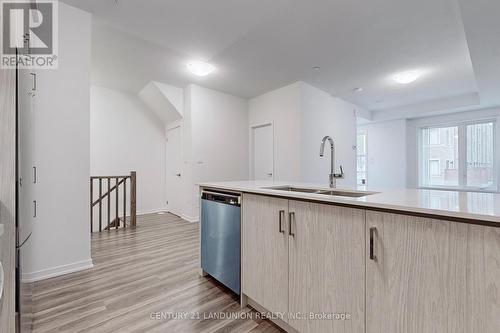 265 - 150 Honeycrisp Crescent, Vaughan, ON - Indoor Photo Showing Kitchen With Double Sink