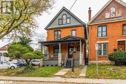 View of front of house with covered porch - 