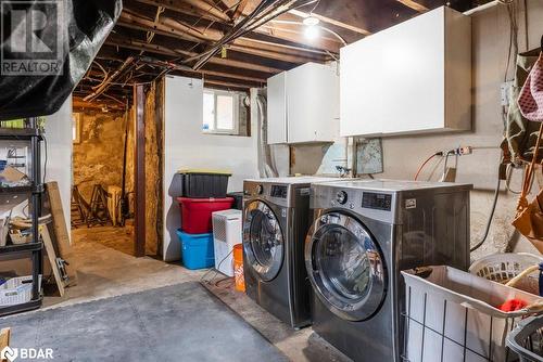 Washer and Dryer in basement - 109 Fairleigh Avenue S, Hamilton, ON - Indoor Photo Showing Laundry Room