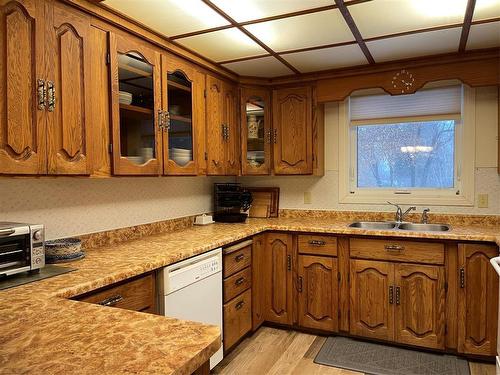 218 Rd & Hwy #10 Highway, Swan River, MB - Indoor Photo Showing Kitchen With Double Sink