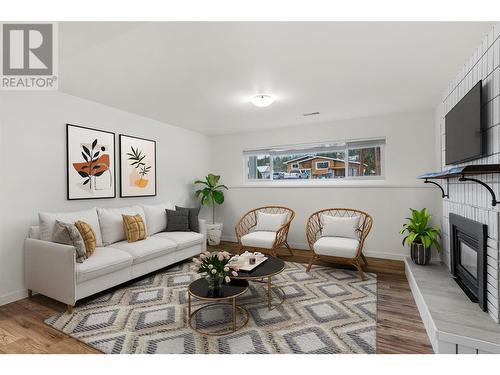 SUITE -living room *virtually staged - 3309 Mcmahon Road, West Kelowna, BC - Indoor Photo Showing Living Room With Fireplace