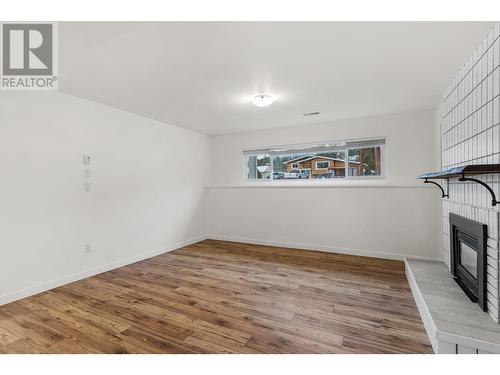 3309 Mcmahon Road, West Kelowna, BC - Indoor Photo Showing Other Room With Fireplace