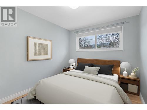 Bedroom 2 main floor *virtually staged - 3309 Mcmahon Road, West Kelowna, BC - Indoor Photo Showing Bedroom