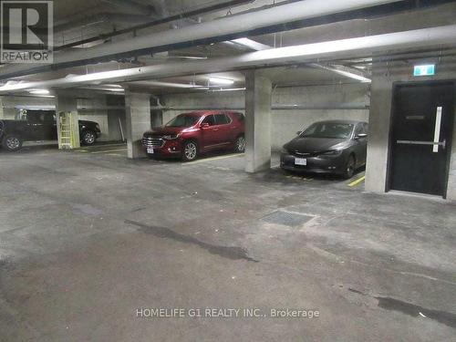 328 - 610 Farmstead Drive, Milton, ON - Indoor Photo Showing Garage