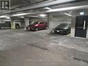 328 - 610 Farmstead Drive, Milton, ON  - Indoor Photo Showing Garage 