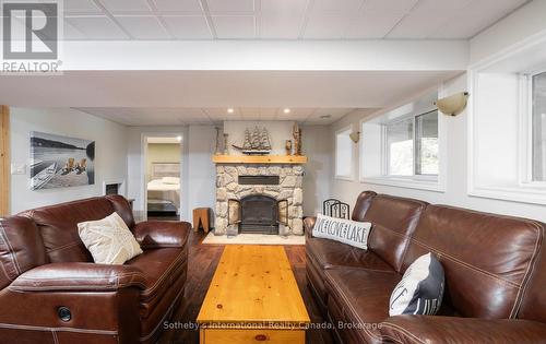 1010 Ransbury Road, Muskoka Lakes (Watt), ON - Indoor Photo Showing Living Room With Fireplace