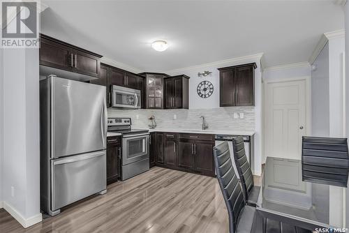 1207 130 Marlatte Crescent, Saskatoon, SK - Indoor Photo Showing Kitchen With Stainless Steel Kitchen