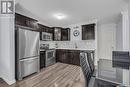 1207 130 Marlatte Crescent, Saskatoon, SK  - Indoor Photo Showing Kitchen With Stainless Steel Kitchen 