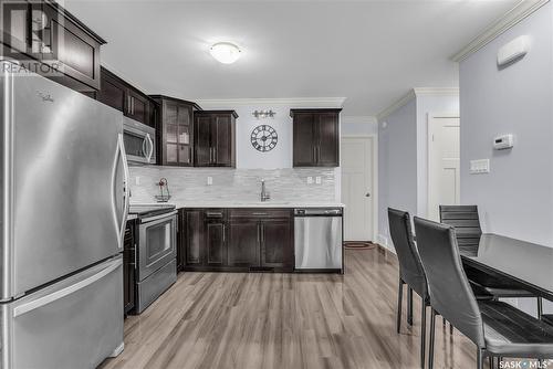 1207 130 Marlatte Crescent, Saskatoon, SK - Indoor Photo Showing Kitchen With Stainless Steel Kitchen With Upgraded Kitchen