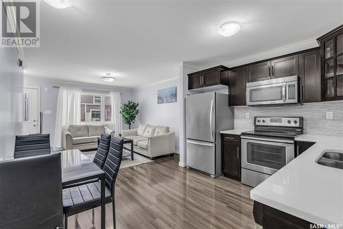 1207 130 Marlatte Crescent, Saskatoon, SK - Indoor Photo Showing Kitchen With Stainless Steel Kitchen With Double Sink With Upgraded Kitchen