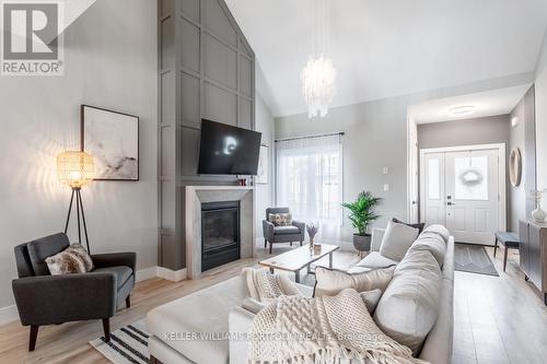 4 - 744 Nelson Street W, Norfolk, ON - Indoor Photo Showing Living Room With Fireplace