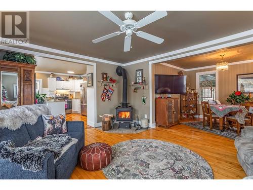 6934 Highway 6, Coldstream, BC - Indoor Photo Showing Living Room With Fireplace