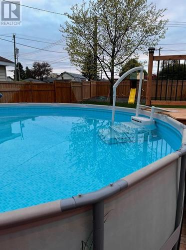 48 Chambers Ave, Sault Ste. Marie, ON - Outdoor With Above Ground Pool With Backyard