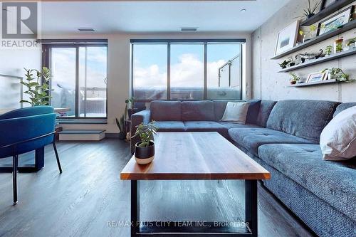 717 - 246 Logan Avenue, Toronto, ON - Indoor Photo Showing Living Room