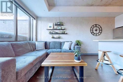 717 - 246 Logan Avenue, Toronto, ON - Indoor Photo Showing Living Room