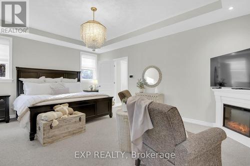 6654 Stillwood Drive, Ottawa, ON - Indoor Photo Showing Bedroom With Fireplace