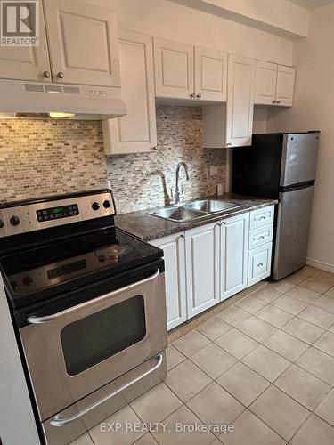 66 Stirton Street, Hamilton, ON - Indoor Photo Showing Kitchen With Double Sink