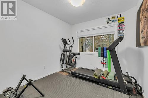 3rd bedroom upstairs - 2125 Burtch Road Unit# 210 Lot# 24, Kelowna, BC - Indoor Photo Showing Gym Room