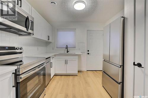 848 Elliott Street, Regina, SK - Indoor Photo Showing Kitchen With Stainless Steel Kitchen