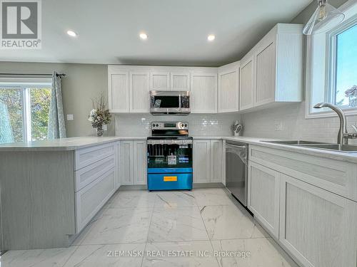 213 Teefy Street, Iroquois Falls, ON - Indoor Photo Showing Kitchen With Double Sink