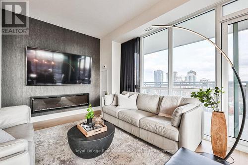 807 - 2025 Maria Street, Burlington (Brant), ON - Indoor Photo Showing Living Room With Fireplace