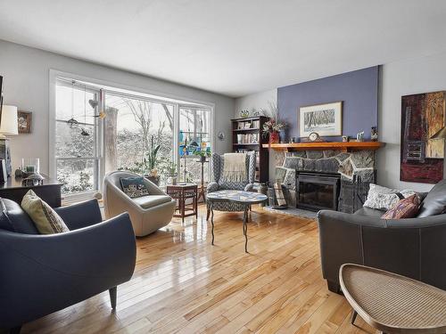 Salon - 185 Rue Michel, Mont-Saint-Hilaire, QC - Indoor Photo Showing Living Room With Fireplace