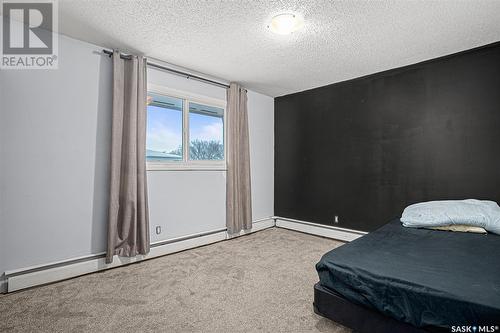 401 522 X Avenue S, Saskatoon, SK - Indoor Photo Showing Bedroom