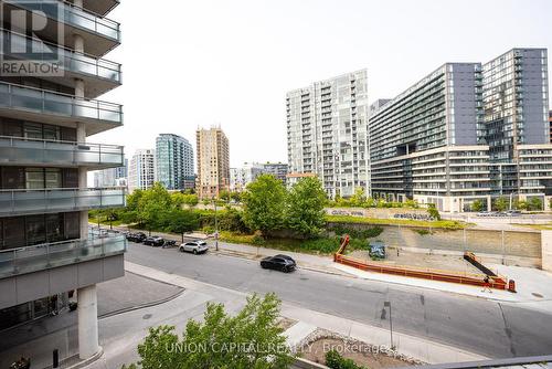 402 - 20 Joe Shuster Way, Toronto, ON - Outdoor With Facade