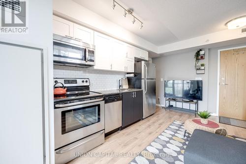 402 - 20 Joe Shuster Way, Toronto, ON - Indoor Photo Showing Kitchen